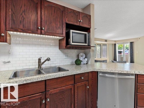 204 9640 105 Street, Edmonton, AB - Indoor Photo Showing Kitchen With Double Sink
