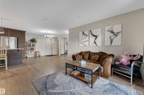 106 4008 Savaryn Drive, Edmonton, AB - Indoor Photo Showing Living Room