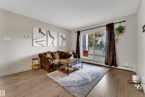 106 4008 Savaryn Drive, Edmonton, AB - Indoor Photo Showing Living Room
