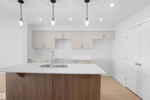 644 176 Avenue, Edmonton, AB - Indoor Photo Showing Kitchen With Double Sink With Upgraded Kitchen