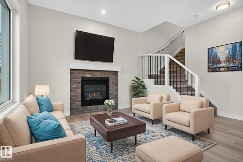 4904 49 Avenue, Gibbons, AB - Indoor Photo Showing Living Room With Fireplace