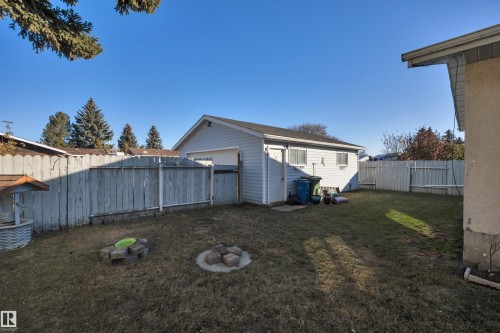 Fenced backyard featuring a garage - 5312 36 Ave, Wetaskiwin, AB - Outdoor