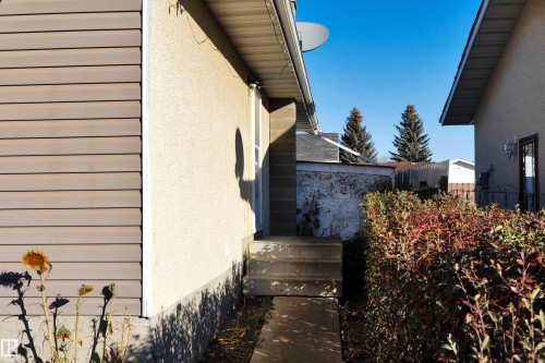 View of home's exterior with stucco siding - 5312 36 Ave, Wetaskiwin, AB - Outdoor With Exterior