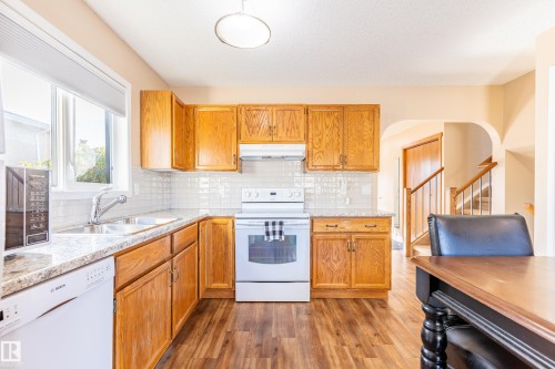 8808 102 Avenue, Morinville, AB - Indoor Photo Showing Kitchen With Double Sink