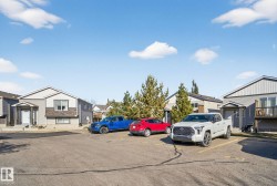 Uncovered parking lot with a residential view - 