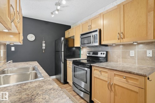 206 6212 180 Street, Edmonton, AB - Indoor Photo Showing Kitchen With Double Sink