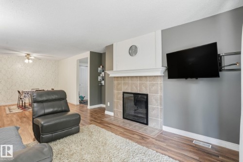 206 6212 180 Street, Edmonton, AB - Indoor Photo Showing Living Room With Fireplace