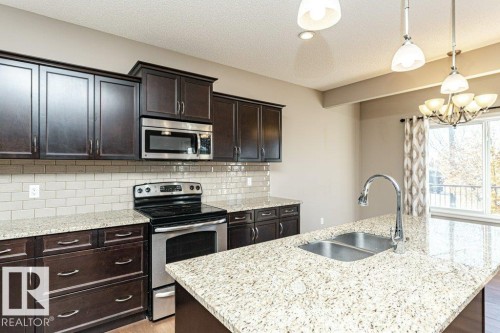 1920 33B Street, Edmonton, AB - Indoor Photo Showing Kitchen With Stainless Steel Kitchen With Double Sink With Upgraded Kitchen