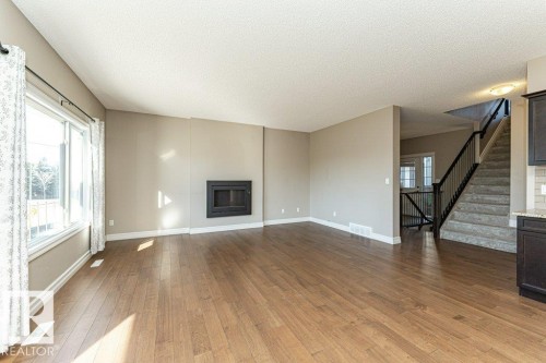 1920 33B Street, Edmonton, AB - Indoor Photo Showing Living Room With Fireplace