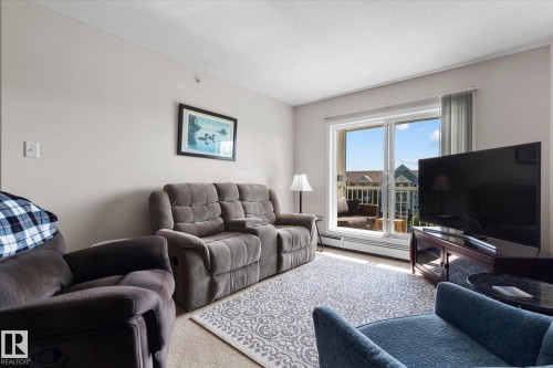 433 50 Woodsmere Close, Fort Saskatchewan, AB - Indoor Photo Showing Living Room