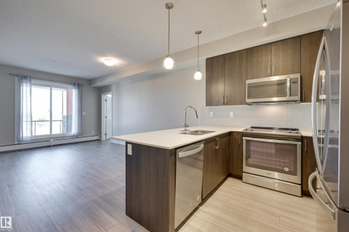 301 17 Columbia Avenue, Devon, AB - Indoor Photo Showing Kitchen With Stainless Steel Kitchen With Upgraded Kitchen