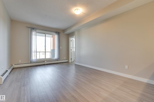 301 17 Columbia Avenue, Devon, AB - Indoor Photo Showing Other Room