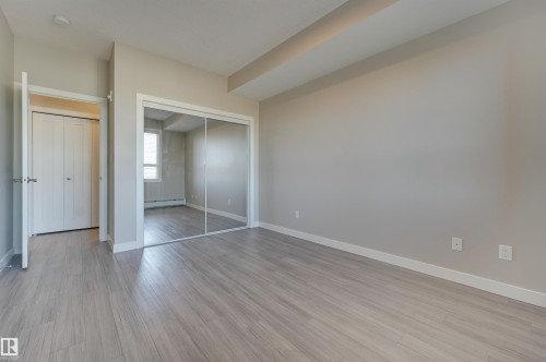 301 17 Columbia Avenue, Devon, AB - Indoor Photo Showing Other Room