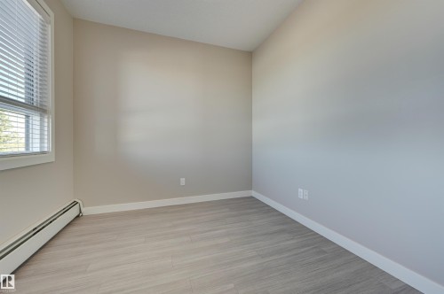 301 17 Columbia Avenue, Devon, AB - Indoor Photo Showing Other Room