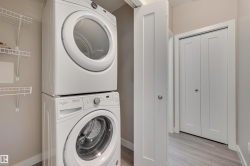 301 17 Columbia Avenue, Devon, AB - Indoor Photo Showing Laundry Room