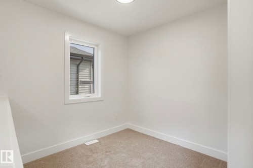 116 Spring Link, Spruce Grove, AB - Indoor Photo Showing Other Room