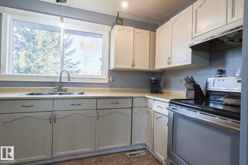 4 54222 Rge Road 25, Rural Lac Ste. Anne County, AB - Indoor Photo Showing Kitchen With Double Sink