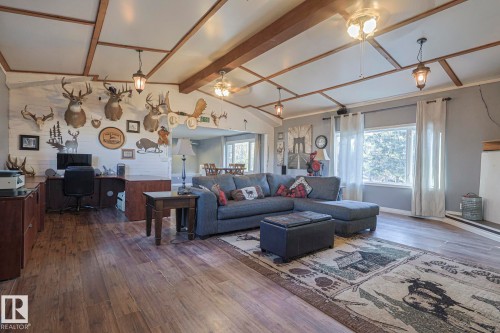 4 54222 Rge Road 25, Rural Lac Ste. Anne County, AB - Indoor Photo Showing Living Room With Fireplace