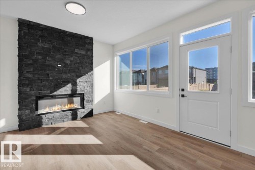 227 Deer Valley Drive, Leduc, AB - Indoor Photo Showing Living Room With Fireplace