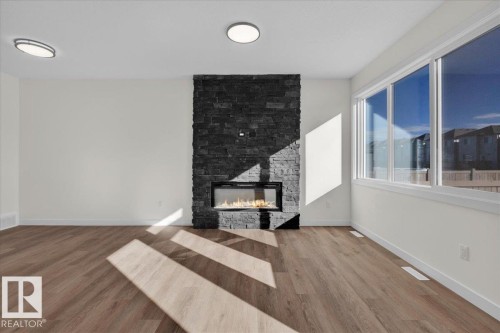 227 Deer Valley Drive, Leduc, AB - Indoor Photo Showing Living Room With Fireplace