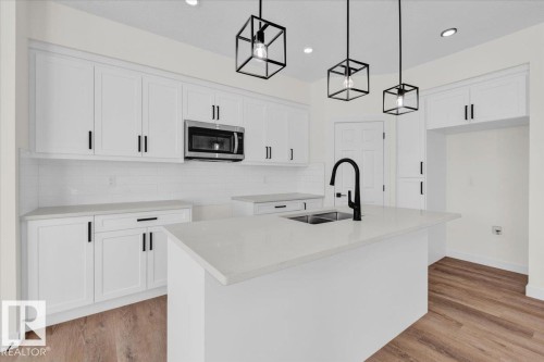 227 Deer Valley Drive, Leduc, AB - Indoor Photo Showing Kitchen With Double Sink