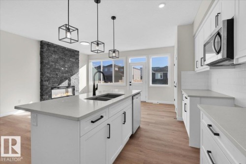 227 Deer Valley Drive, Leduc, AB - Indoor Photo Showing Kitchen With Double Sink