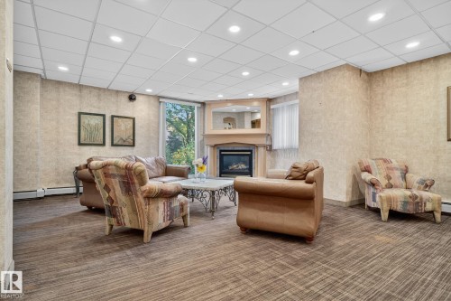 1701 10150 117 Street, Edmonton, AB - Indoor With Fireplace