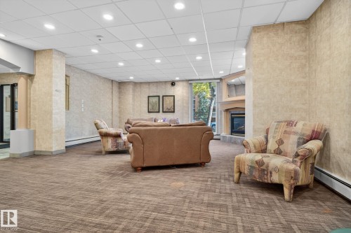 1701 10150 117 Street, Edmonton, AB - Indoor With Fireplace
