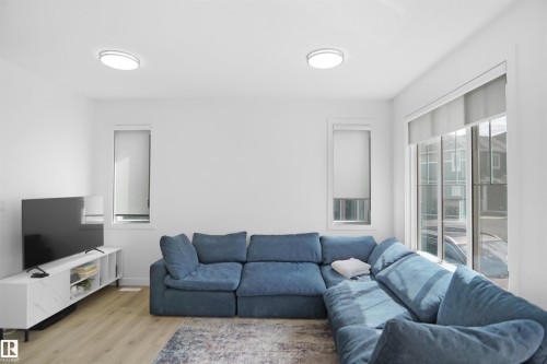 13, 603 Orchards Boulevard Sw, Edmonton, AB - Indoor Photo Showing Living Room