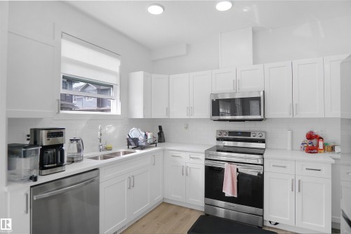 13, 603 Orchards Boulevard Sw, Edmonton, AB - Indoor Photo Showing Kitchen With Double Sink With Upgraded Kitchen