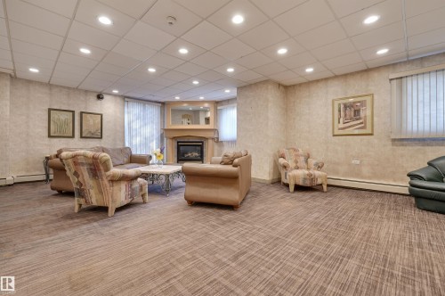 905 10150 117 Street, Edmonton, AB - Indoor With Fireplace