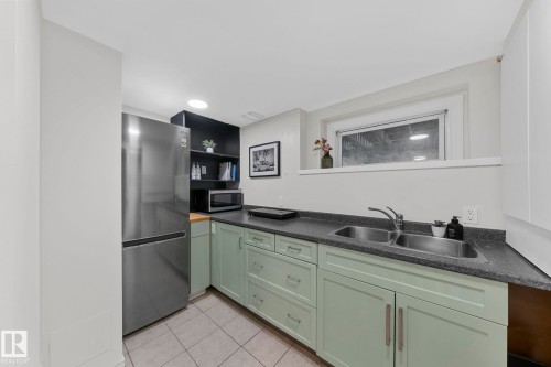 9809 83 Avenue, Edmonton, AB - Indoor Photo Showing Kitchen With Double Sink