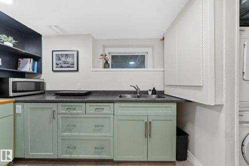 9809 83 Avenue, Edmonton, AB - Indoor Photo Showing Kitchen With Double Sink