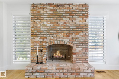 100 Wolf Willow Crescent, Edmonton, AB - Indoor Photo Showing Living Room With Fireplace