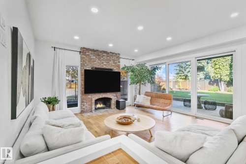 100 Wolf Willow Crescent, Edmonton, AB - Indoor Photo Showing Living Room With Fireplace