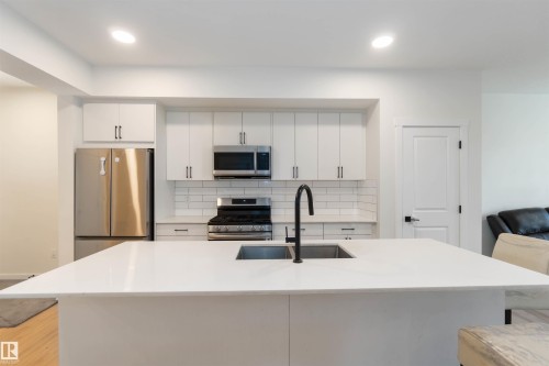 2172 52 St, Edmonton, AB - Indoor Photo Showing Kitchen With Double Sink With Upgraded Kitchen