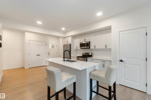 2172 52 St, Edmonton, AB - Indoor Photo Showing Kitchen With Double Sink