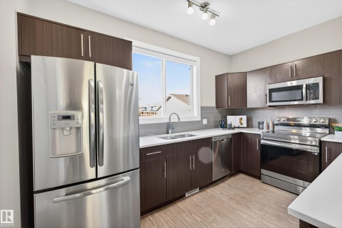 2126 24 Street, Edmonton, AB - Indoor Photo Showing Kitchen With Double Sink