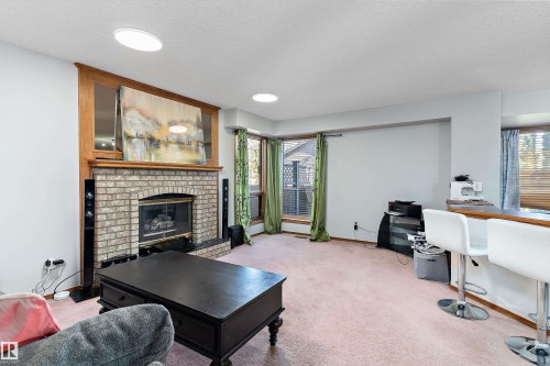15903 62 Street, Edmonton, AB - Indoor Photo Showing Other Room With Fireplace