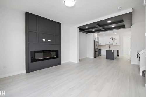 2107 Crossbill Lane, Edmonton, AB - Indoor Photo Showing Living Room With Fireplace