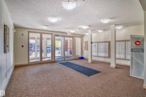 202 3315 James Mowatt Trail, Edmonton, AB - Indoor Photo Showing Other Room