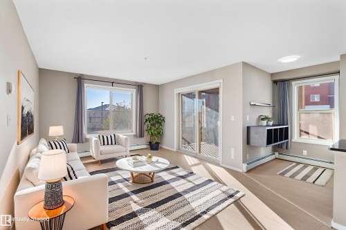 202 3315 James Mowatt Trail, Edmonton, AB - Indoor Photo Showing Living Room