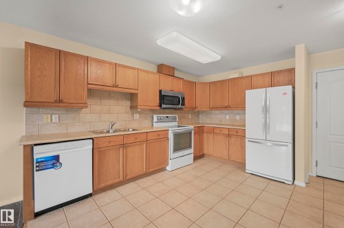 131 592 Hooke Road, Edmonton, AB - Indoor Photo Showing Kitchen With Double Sink