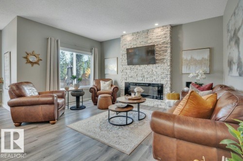 477 Roberts Crescent, Leduc, AB - Indoor Photo Showing Living Room With Fireplace