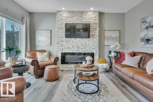 477 Roberts Crescent, Leduc, AB - Indoor Photo Showing Living Room With Fireplace
