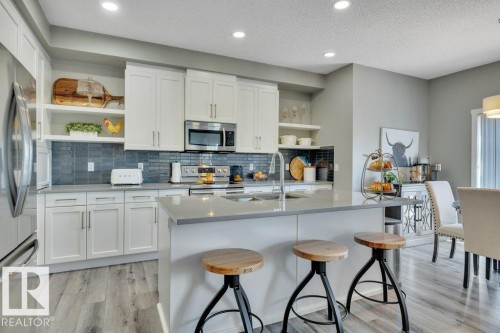 477 Roberts Crescent, Leduc, AB - Indoor Photo Showing Kitchen With Double Sink With Upgraded Kitchen