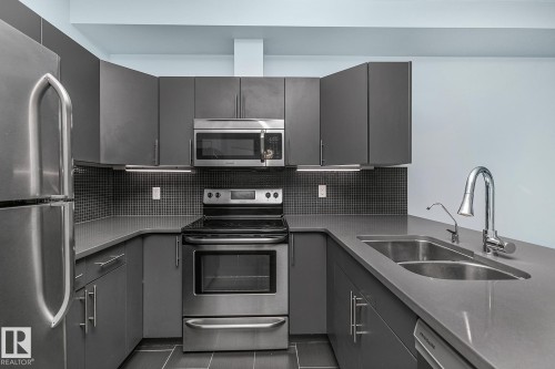302 10611 117 Street, Edmonton, AB - Indoor Photo Showing Kitchen With Double Sink With Upgraded Kitchen