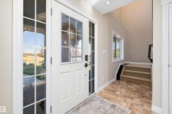 Entryway with baseboards and stairway - 