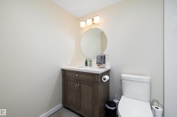 Bathroom featuring vanity and toilet - 