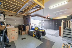 Garage featuring a garage door opener - 